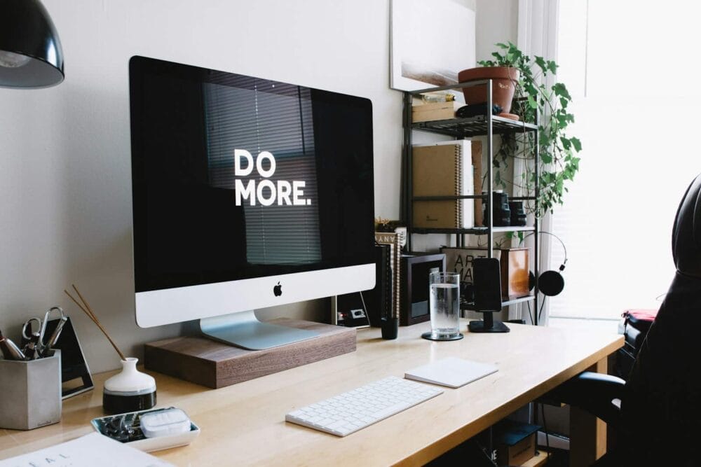 Photo by Carl Heyerdahl why website speed matters silver iMac with keyboard and trackpad inside room